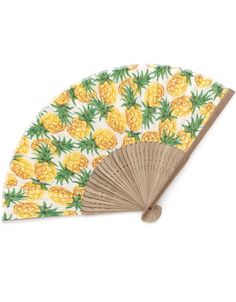 a fan with pineapples printed on it