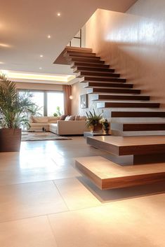 a living room filled with furniture and stairs