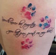 a woman's thigh with watercolor ink on it and the words you will never be forgotten