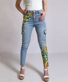 Hello there! Welcome to my custom store, and thank you for your interest! You've just stumbled upon a unique piece that will undoubtedly become a rare gem in your wardrobe. Behold, these SUNFLOWER jeans, meticulously crafted by ATELIER TUFFERY in France, using only the finest 100% cotton. You can choose between moms, straight and slim models. Adorning the front of these jeans is a 100% hand-painted design with sunflowers. I employ high-quality, wash-resistant paints to ensure an incredible and e Sunflower Jeans, Jeans Skirt Outfit, Custom Pants, Sunflower Birthday, Painted Clothes Diy, Painted Clothing, Unicorn Outfit, Custom Jeans, Painted Jeans