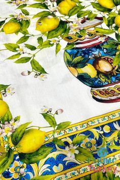 a table cloth with lemons on it