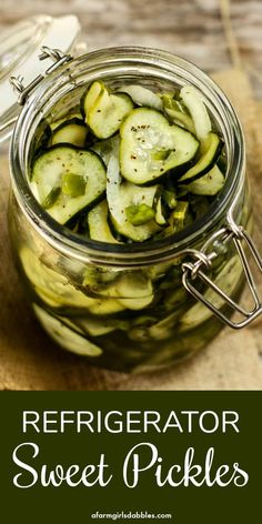 a jar filled with pickles on top of a wooden table