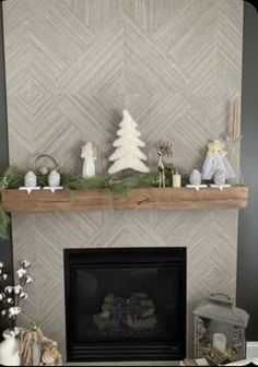 a mantel with christmas decorations on top of it