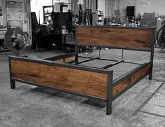 a bed frame made out of wood and metal