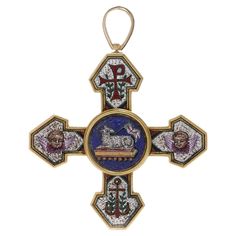 Antique Italian 22kt. yellow gold pendant/brooch Micro Mosaic cross.Made in the Papal workshops , marked with the Vatican stamp of the Papal tiara with the keys of St. Peter Circa 1850's - 1860s Dimensions:Length x width x height: 7 x 5.7 cm Weight: 27 grams This brooch pendant is designed in the shape of a cross, with detailed micro mosaic work depicting various religious and symbolic motifs. The central roundel features the Agnus Dei, or Lamb of God, holding a flag, a symbol of Christ's sacrif Papal Tiara, Chi Rho, Cross Wreath, Agnus Dei, Mosaic Crosses, Pendant Brooch, Gold For Sale, St Pierre, The Vatican