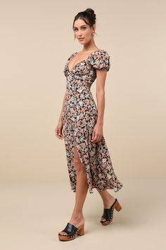 Be the cottage cutie you've been dreaming to be thanks to the Lulus Meadow Muse Black Floral Tie-Back Puff Sleeve Midi Dress! Lightweight woven fabric, decorated with a vintage-inspired floral print, shapes a lightly gathered triangle bodice, a sweetheart neckline accented with crocheted ladder lace, and short puff sleeves with elastic at the shoulders and cuffs. Two sets of tying straps secure atop an open back. A high, empire waist tops an A-line skirt that falls to a midi hem with a flirty si Short Floral Dresses, Midi Dress Floral, Empire Waist Tops, Puff Sleeve Midi Dress, Lulu Fashion, Adhesive Bra, The Cottage, Tie Dress, Floral Dress Black