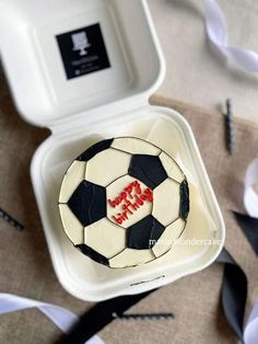 a cake in the shape of a soccer ball