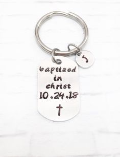 Stamped with "baptized in christ".  It is a unique, meaningful and personalized baptism gift for men and teens who decide to be baptized along with the date of baptism and a cross stamp.   Please leave date in "note to seller" box at checkout. The date will be only stamped in format "6.18.17" due to space limited OR "18.6.17" due to some counties read in this format. Therefore, please specify your date format, it will help to expedite your order.  If no specify, the date will always be stamped in format "6.18.17"  It comes with a nice gift box, it is ready for gifting or gift for self.   This listing is for ONE high quality sturdy stainless steel keyrings with 1. 1 1/4x 3/4" aluminum dog tag 2. 3/8" initial tag at your choice Please note I could only stamp one side of the blank cause the i Christian Keychains, Baptism Necklace, Adult Baptism Gifts, Adult Baptism, Getting Baptized, Baptism Photos, Christian Bracelets, Baptism Gifts, Stamped Jewelry