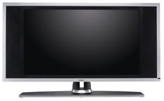 a flat screen tv sitting on top of a metal stand