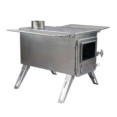 a stainless steel stove sitting on top of a metal stand