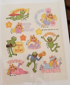 some stickers on a white sheet that says, super hero and the froggy princess