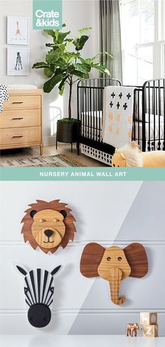 three wooden animal wall hangings on the wall in a child's room, one is