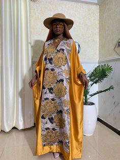 wedding outfit inspiration🥰. Also perfect for other social events when you need to make a fashion statement. ✅FABRIC TYPE  ✔️Main fabric is Silk, designed with Brocade on the front and the sleeves. Fabric has a luxurious feel, smooth and comfortable on the skin.  ✅SIZE  ✔️Free size as seen on the model.One size fits all. Body circumference measures 70inches.  ✔️Floor length. kaftan is 59 inches long.  ‼️Have a question/concern or need help placing an order? Do send us a message. We'd be glad to Yellow Long Sleeve Kaftan For Wedding, Gold Maxi Length Abaya For Party, Yellow Silk Floor-length Gown, Elegant Gold Maxi Length Abaya, Yellow Floor-length Silk Gown, Gold Floor-length Party Abaya, Satin Floor-length Abaya For Eid, Gold Floor-length Bohemian Abaya, Gold Maxi Length Gown For Eid