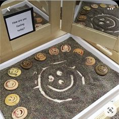 there is a door mat with smiley faces on it