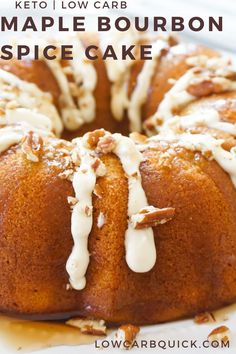 a bundt cake with white icing and nuts on top