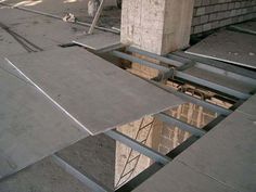 an image of a building being constructed with concrete