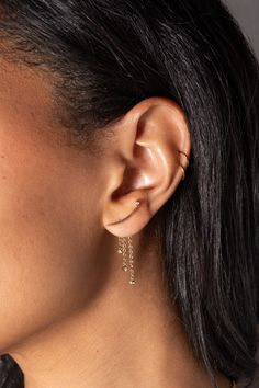 Send your style into the stratosphere with these Celestial Shooting Star Ear Jacket Earrings. This innovative earring design can be styled in two ways: wear the crystal-accented starburst studs alone, or with the removable ear jackets, which feature clear crystals on dangling chains that go behind the ear. Wear them as a reminder of your own celestial power, or gift it to someone you love more than the moon and the stars. Ear Constellation, Ear Jacket Earring Gold, Jacket Earrings, The Moon And The Stars, Ear Jacket Earring, Earring Jackets, Ear Jacket, Celestial Jewelry, Shooting Star