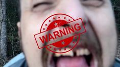 a man with his mouth open and the word warning printed on it