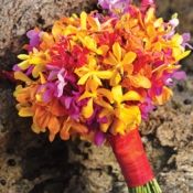 a bouquet of flowers is sitting on the ground