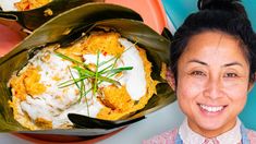 a woman is smiling next to a plate of food with rice and vegetables on it