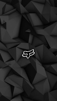 the fox logo is shown on an abstract black background with low - poly shapes and white lettering