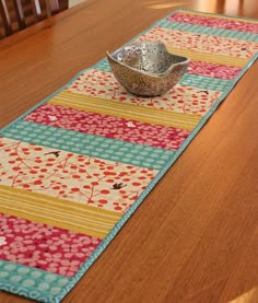 a table runner with a bowl on it