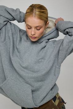 Oversized fit Hooded sweatshirt with front pockets Fabric: 100% French terry cotton Machine wash cold, low heat Model Measurements: Height 5'8, Bust 32B, Waist: 25/26", Hips 34" Model is wearing a size XS/S Made in Los Angeles Cozy Fit Sweatshirt With Adjustable Hood For Loungewear, Relaxed Fit Hooded Cozy Sweats, Cozy Hooded Sweats With Relaxed Fit, Cozy Relaxed Fit Hooded Sweats, Relaxed Fit Sweatshirt With Adjustable Hood For Loungewear, Cozy Fit Hoodie With Kangaroo Pocket, Comfortable Hoodie With Kangaroo Pocket And Cozy Fit, Comfy Hoodie With Cozy Fit And Ribbed Cuffs, Comfy Cozy Fit Hoodie With Ribbed Cuffs