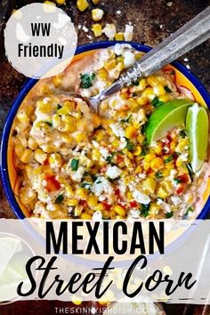 mexican street corn in a blue bowl with a spoon and lime wedges on the side