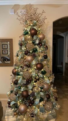 a decorated christmas tree in a living room