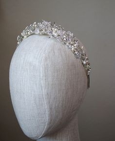 Graceful bridal tiara adorned with creamy pearls and glistening crystals | wedding, bridal outfits, wedding hairstyles, wedding hair bride, wedding hair accessories, bridal hair accessories, bride hairstyle, bridal hair ideas, bridal hairstyles, bridal tiara, bridal crown, bridal headpieces, diamond headpiece, headpieces for brides, pearl tiara, diamond tiara, crystal tiara, floral tiara, bride wedding hair, elegant bride, modern bride, princess bride, 2024 bride #wedding #weddinghair #bride Luxury Wedding Headpieces, Wedding Teardrop Crown Headpiece, Kate Coronation, Diamond Headpiece, Ethereal Jewelry, Floral Tiara, Veil Accessories, Crystal Bridal Tiaras, Pearl Tiara