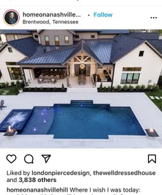 an aerial view of a house with a swimming pool