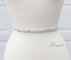 "LISALI Sparkly Wedding Belt, Bling Belts, Rhinestone Belt, Wedding Belts, Bridal Belts, Rhinestone Chain Belt, Crystal Sash Belt This dazzling bridal sash belt is fitted with the finest crystal rhinestones & pearls that will take your breath away! 💗Made of - This beautiful sash is made with sparkly rhinestones details, very elegant. - Width: 0.5 inches. - The ribbon in the main picture is bridal white.( ribbon can be any color you would like) 💗Finsh/Ribbon color - Satin / Oraganza ribbon Belt Wedding Dress, Bridesmaid Belt, Bling Belts, Bridal Sash Belt, Wedding Belt, Wedding Dress Belt, Beautiful Hair Accessories, Wedding Garter Set, Sparkly Wedding