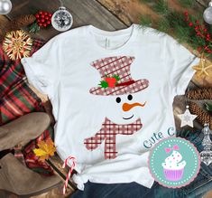 a white shirt with a snowman on it