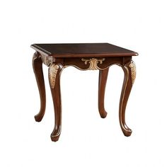 a wooden table with an ornate design on it's top and bottom edge, against a white background