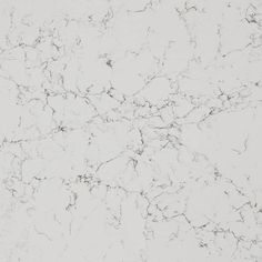 a white marble counter top that looks like it could be used as a wallpaper