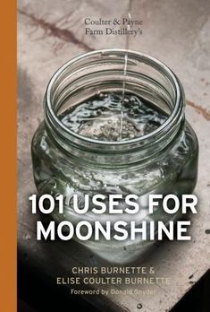 a jar filled with water sitting on top of a table