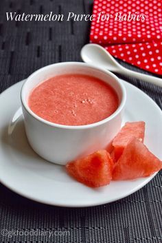 a bowl of watermelon puree on a plate