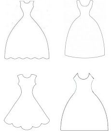 four dresses are cut out and ready to be used in the sewing pattern for children's clothing