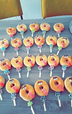 there are many donuts with faces on them