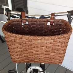 a close up of a basket on a bicycle