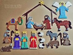 a cross stitch nativity scene with the birth of jesus