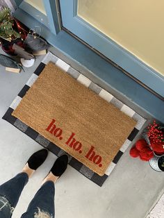 someone is standing in front of a door with their feet on the mat that says, do not enter