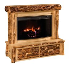 a wooden fireplace with logs on it