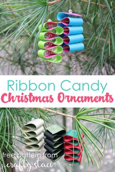 a christmas ornament hanging from a pine tree with the text ribbon candy christmas ornaments