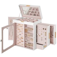 an open jewelry box filled with lots of different items