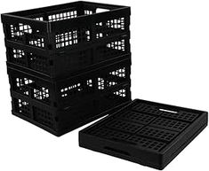 three black plastic crates sitting next to each other