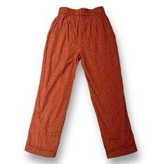 These Pants Are Really Pretty. Featuring: Elastic Waist, Pull On Style, Front Side Slip Pockets, Loose Fit, Cuff Hem, Cropped Length. Lined, In A Pretty 100 % Cotton Outer And Lining. The Color Is A Beautiful Burnt Orange With Faded Black Vertical Stripes All Over. Perfect For Fall. These Are Light, Comfortable And Flattering. Nwt Measurements Flat Lay: L-37” Rise-11” Inseam-26” Waist-13” Hip-21” Hem-7” Black Striped Pants, Vertical Stripes, Striped Pants, Black Orange, Burnt Orange, Black Stripes, Orange Black, Pant Jumpsuit, Elastic Waist