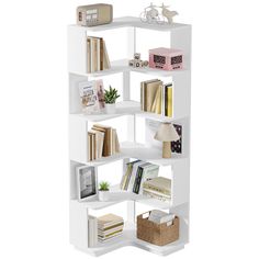 a white book shelf with books and other items on top of it, against a white background