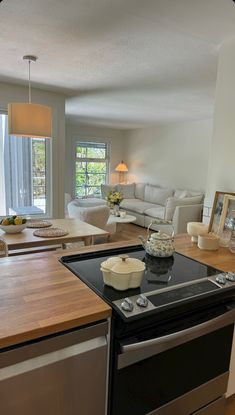 the kitchen is clean and ready to be used as a living room or dining area