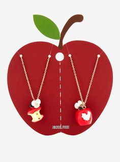 Who's the apple to your eye? Match with your bestie with these berry sweet apple necklaces! This set has an apple core charm on one and a bitten apple on the other  with matching apple blossom charms on each.18" + 3" extenderNickel-free alloy; acrylicSet of 2Imported Shrink Charms, Apple Outfits, Apple Clothes, Bitten Apple, Christmas Wishlist Ideas, Apple Jewelry, Apple Necklace, Pretty Gifts, Apple Core